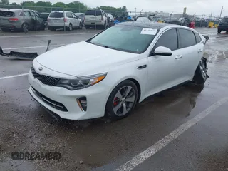 2018 Kia Optima SX with VIN 5XXGW4L2XJG247253, listed as a IAAI auction lot 42236935 with 40,737 mi miles and . Bid and sale history available at DreamBid. Image 2.
