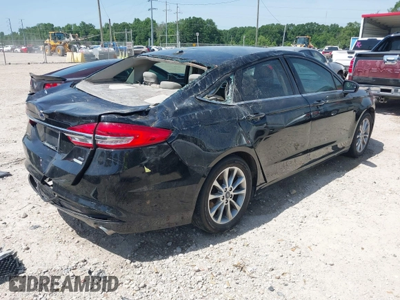 2017 Ford Fusion SE z VIN 3FA6P0HDXHR198388, wystawiony jako IAAI lot #42231069 z przebiegiem 143 709 mil mil oraz . Historia ofert i sprzedaży dostępna na DreamBid. Obrazek 4.