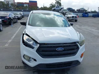 2018 Ford Escape S z VIN 1FMCU0F78JUA56974, wystawiony jako IAAI lot #42232294 z przebiegiem 63 511 mil mil oraz . Historia ofert i sprzedaży dostępna na DreamBid. Obrazek 6.