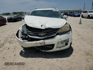 2015 Chevrolet Traverse LT z VIN 1GNKVHKD1FJ324447, wystawiony jako Copart lot #60362725 z przebiegiem 107 863 mil mil oraz Szkoda całkowita • Salvage title. Historia ofert i sprzedaży dostępna na DreamBid. Obrazek 13.
