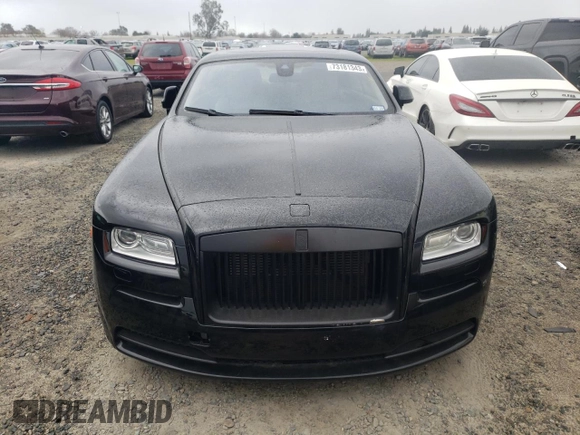 2014 Rolls-Royce Wraith z VIN SCA665C5XEUX84336, wystawiony jako Copart lot #73181343 z przebiegiem 34 367 mil mil oraz Szkody całkowita. Historia ofert i sprzedaży dostępna na DreamBid. Obrazek 5.