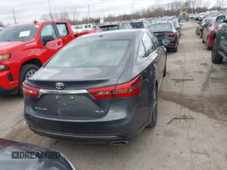 2018 Toyota Avalon XLE with VIN 4T1BK1EB9JU275097, listed as a IAAI auction lot 41940585 with 119,854 mi miles and . Bid and sale history available at DreamBid. Image 16.