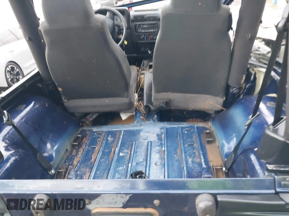 2006 Jeep Wrangler X with VIN 1J4FA39SX6P735379, listed as a IAAI auction lot 40945788 with 69,868 mi miles and . Bid and sale history available at DreamBid. Image 8.