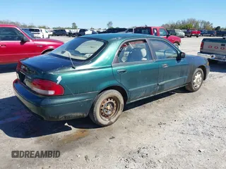 1999 Mazda 626 ES with VIN 1YVGF22C2X5859646, listed as a IAAI auction lot 41887343 with 1 mi miles. Bid and sale history available at carsss.com. Image 4.
