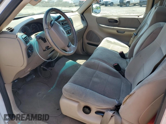 2002 Ford F-150 XL with VIN 1FTRX17L42NB56461, listed as a Copart auction lot 59988885 with 244,057 mi miles and Clean title. Bid and sale history available at DreamBid. Image 7.