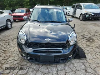2014 MINI Countryman S with VIN WMWZC3C56EWP25479, listed as a Copart auction lot 61197525 with 101,146 mi miles and Salvage title. Bid and sale history available at DreamBid. Image 5.