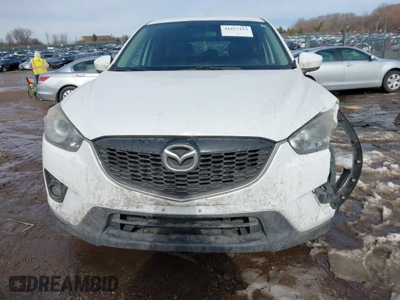 2014 Mazda CX-5 Grand Touring with VIN JM3KE4DY9E0300491, listed as a IAAI auction lot 41657153 with 157,394 mi miles and . Bid and sale history available at DreamBid. Image 12.
