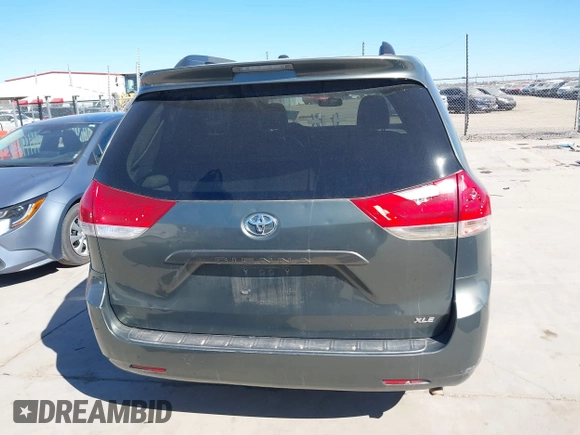 2013 Toyota Sienna XLE AAS with VIN 5TDYK3DCXDS379272, listed as a IAAI auction lot 41407282 with 240,491 mi miles and . Bid and sale history available at carsss.com. Image 16.