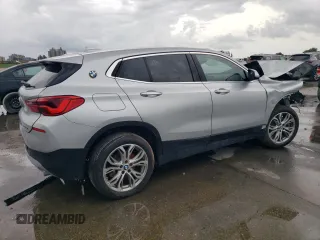 2018 BMW X2 sDrive28i with VIN WBXYJ3C32JEJ75719, listed as a Copart auction lot 60884755 with Not provided miles and Salvage title. Bid and sale history available at DreamBid. Image 3.