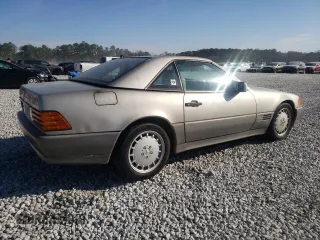 1990 Mercedes-Benz 500 z VIN WDBFA66E8LF010613, wystawiony jako Copart lot #47093275 z przebiegiem 120 814 mil mil oraz Szkody całkowita. Historia ofert i sprzedaży dostępna na DreamBid. Obrazek 3.