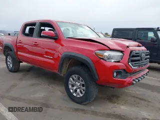 2023 Toyota Tacoma 4WD SR with VIN 3TMCZ5AN9PM628155, listed as a IAAI auction lot 42035014 with 22,264 mi miles. Bid and sale history available at carsss.com. Image 1.