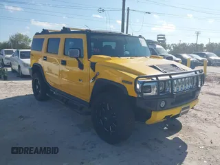 2003 Hummer H2 with VIN 5GRGN23U93H108017, listed as a IAAI auction lot 41793034 with 203,739 mi miles. Bid and sale history available at carsss.com. Image 1.