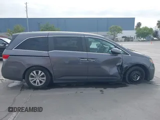 2016 Honda Odyssey EX-L with VIN 5FNRL5H68GB104350, listed as a IAAI auction lot 42023306 with 124,672 mi miles. Bid and sale history available at carsss.com. Image 14.