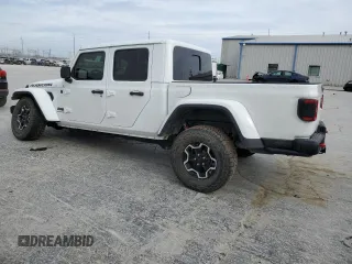 2020 Jeep Gladiator Rubicon z VIN 1C6JJTBG3LL156802, wystawiony jako Copart lot #48904865 z przebiegiem 30 704 mil mil oraz Szkoda całkowita • Salvage title. Historia ofert i sprzedaży dostępna na DreamBid. Obrazek 2.