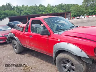 2001 Nissan Frontier SE Desert Runner z VIN 1N6ED26T31C354339, wystawiony jako IAAI lot #42279697 z przebiegiem Nie podano mil oraz . Historia ofert i sprzedaży dostępna na DreamBid. Obrazek 11.