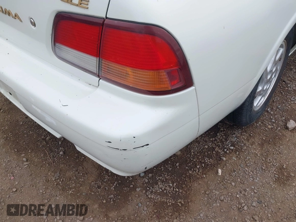 1999 Nissan Maxima GXE with VIN JN1CA21D7XT811913, listed as a IAAI auction lot 42374679 with 209,172 mi miles and . Bid and sale history available at DreamBid. Image 6.