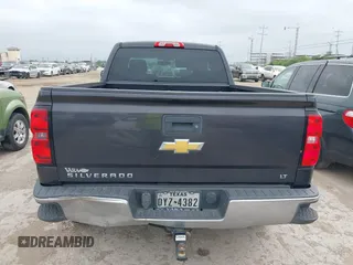 2014 Chevrolet Silverado 1500 LT with VIN 1GCRCREH5EZ371465, listed as a IAAI auction lot 42185657 with 112,151 mi miles and . Bid and sale history available at DreamBid. Image 16.