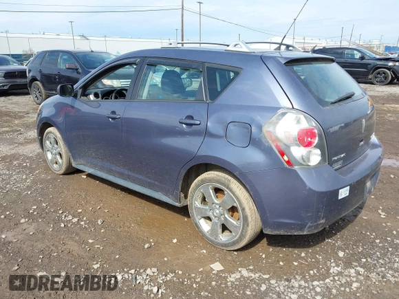2009 Pontiac Vibe with VIN 5Y2SM67069Z422076, listed as a IAAI auction lot 42158045 with 180,568 mi miles. Bid and sale history available at carsss.com. Image 3.