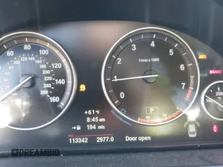 2013 BMW 5 Series 528i with VIN WBAXG5C55DD233592, listed as a IAAI auction lot 41827491 with 113,342 mi miles and . Bid and sale history available at carsss.com. Image 7.