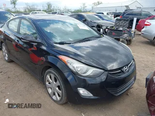 2012 Hyundai Elantra GLS with VIN KMHDH4AE8CU407441, listed as a IAAI auction lot 42125996 with 187,536 mi miles. Bid and sale history available at carsss.com. Image 1.