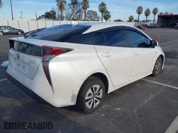 2018 Toyota Prius Two with VIN JTDKARFU1J3066710, listed as a IAAI auction lot 41636185 with 123,399 mi miles. Bid and sale history available at carsss.com. Image 4.