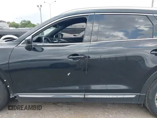 2018 Mazda CX-9 Grand Touring with VIN JM3TCADY3J0205878, listed as a IAAI auction lot 42178507 with 243,703 mi miles and . Bid and sale history available at DreamBid. Image 14.