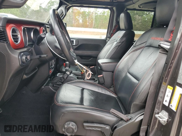 2018 Jeep Wrangler Unlimited Rubicon with VIN 1C4HJXFN9JW249214, listed as a Copart auction lot 42692175 with 161,157 mi miles and Salvage title. Bid and sale history available at DreamBid. Image 7.