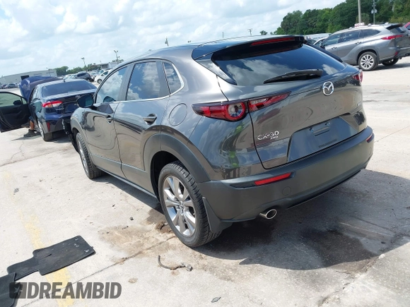 2021 Mazda CX-30 Select with VIN 3MVDMBBL2MM261169, listed as a IAAI auction lot 41938783 with 74,996 mi miles. Bid and sale history available at carsss.com. Image 3.