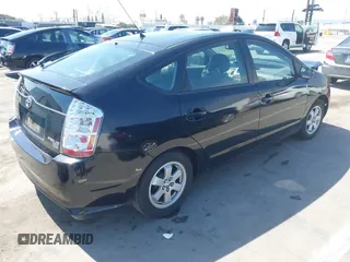 2007 Toyota Prius with VIN JTDKB20UX73228033, listed as a IAAI auction lot 41851668 with 242,138 mi miles. Bid and sale history available at carsss.com. Image 4.