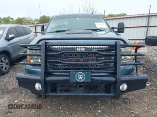 2013 GMC Sierra 2500HD SLT with VIN 1GT121E82DF189658, listed as a IAAI auction lot 42080921 with 160,616 mi miles and . Bid and sale history available at DreamBid. Image 6.
