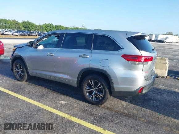 2018 Toyota Highlander LE with VIN 5TDZARFH7JS040614, listed as a IAAI auction lot 41922010 with 74,473 mi miles and . Bid and sale history available at DreamBid. Image 3.