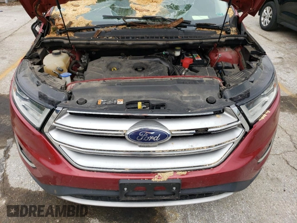 2015 Ford Edge Titanium z VIN 2FMPK4K9XFBB74740, wystawiony jako Copart lot #55529335 z przebiegiem 155 605 mil mil oraz Szkoda całkowita • Salvage title. Historia ofert i sprzedaży dostępna na DreamBid. Obrazek 11.