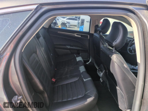 2017 Ford Fusion SE z VIN 3FA6P0H98HR350163, wystawiony jako Copart lot #54196545 z przebiegiem Nie podano mil oraz Szkoda całkowita • Salvage title. Historia ofert i sprzedaży dostępna na DreamBid. Obrazek 10.