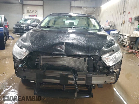 2015 Ford Taurus Limited with VIN 1FAHP2F8XFG184733, listed as a Copart auction lot 48056685 with 131,649 mi miles and Salvage Title. Bid and sale history available at carsss.com. Image 5.