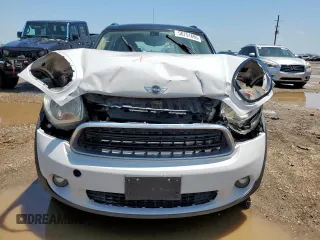 2015 MINI Countryman with VIN WMWZB3C52FWR43973, listed as a Copart auction lot 56751695 with 117,096 mi miles and Salvage title. Bid and sale history available at DreamBid. Image 5.