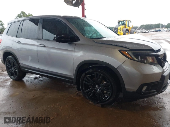 2021 Honda Passport Sport with VIN 5FNYF7H26MB014556, listed as a IAAI auction lot 41683680 with 97,829 mi miles and . Bid and sale history available at DreamBid. Image 1.