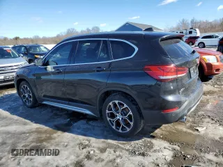 2021 BMW X1 xDrive28i with VIN WBXJG9C04M5T78933, listed as a Copart auction lot 45018135 with 72,067 mi miles and Salvage Title. Bid and sale history available at carsss.com. Image 2.