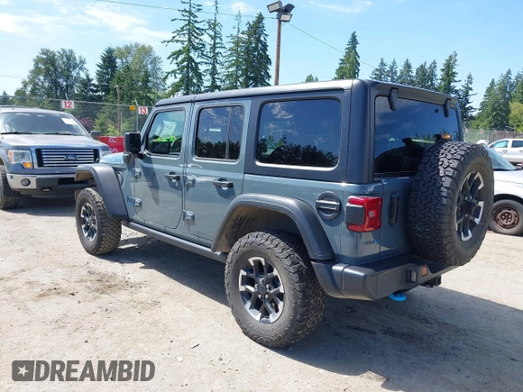 2024 Jeep Wrangler Rubicon X z VIN 1C4RJXR6XRW240316, wystawiony jako IAAI lot #42477607 z przebiegiem 41 375 mil mil oraz . Historia ofert i sprzedaży dostępna na DreamBid. Obrazek 3.