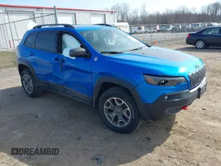 2021 Jeep Cherokee Trailhawk z VIN 1C4PJMBX4MD222987, wystawiony jako IAAI lot #41771808 z przebiegiem 52 533 mil mil oraz . Historia ofert i sprzedaży dostępna na DreamBid. Obrazek 1.