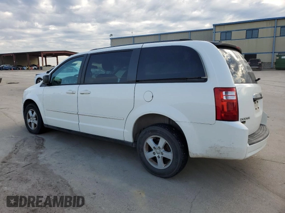 2010 Dodge Grand Caravan SE with VIN 2D4RN4DE9AR237795, listed as a Copart auction lot 55561025 with 212,109 mi miles and Clean Title. Bid and sale history available at DreamBid. Image 2.