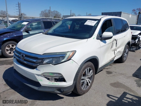 2017 Honda Pilot EX-L with VIN 5FNYF5H56HB048081, listed as a IAAI auction lot 41781054 with 124,450 mi miles. Bid and sale history available at carsss.com. Image 17.
