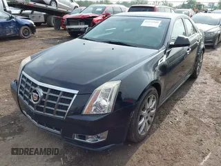2012 Cadillac CTS Luxury z VIN 1G6DG5E57C0131349, wystawiony jako IAAI lot #42272340 z przebiegiem 61 879 mil mil oraz . Historia ofert i sprzedaży dostępna na DreamBid. Obrazek 2.