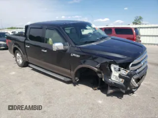 2015 Ford F-150 XLT with VIN 1FTEW1EF2FKE26597, listed as a Copart auction lot 58212385 with 123,756 mi miles and Salvage title. Bid and sale history available at DreamBid. Image 4.