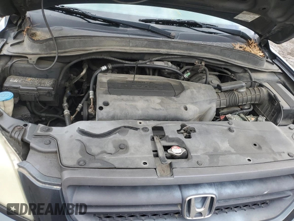 2003 Honda Pilot EX z VIN 2HKYF18523H619553, wystawiony jako Copart lot #58941715 z przebiegiem 281 041 mil mil oraz Szkoda całkowita • Salvage title. Historia ofert i sprzedaży dostępna na DreamBid. Obrazek 12.