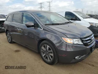 2015 Honda Odyssey Touring Elite z VIN 5FNRL5H96FB047204, wystawiony jako Copart lot #56297985 z przebiegiem 125 482 mil mil oraz Szkoda całkowita • Salvage title. Historia ofert i sprzedaży dostępna na DreamBid. Obrazek 4.