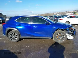 2019 Lexus UX 250h z VIN JTHU9JBH4K2015400, wystawiony jako IAAI lot #41525608 z przebiegiem Nie podano mil oraz . Historia ofert i sprzedaży dostępna na DreamBid. Obrazek 12.