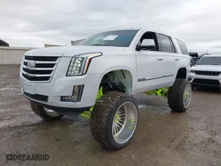 2020 Cadillac Escalade Luxury with VIN 1GYS3BKJ6LR124477, listed as a IAAI auction lot 41471894 with 42,439 mi miles. Bid and sale history available at carsss.com. Image 2.