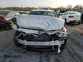 2017 BMW 3 Series 320i xDrive z VIN WBA8E5G56HNU41632, wystawiony jako Copart lot #51628865 z przebiegiem 45 978 mil mil oraz Szkoda całkowita • Salvage title. Historia ofert i sprzedaży dostępna na DreamBid. Obrazek 5.