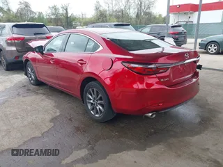 2020 Mazda 6 Sport with VIN JM1GL1UM9L1526019, listed as a IAAI auction lot 42092321 with 73,660 mi miles and . Bid and sale history available at DreamBid. Image 3.