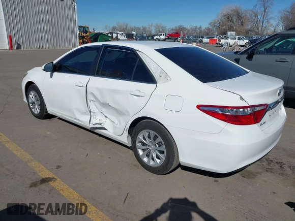 2015 Toyota Camry XLE with VIN 4T4BF1FK7FR465495, listed as a IAAI auction lot 41684622 with 126,543 mi miles and . Bid and sale history available at carsss.com. Image 2.